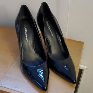 Black patent leather high heeled shoes